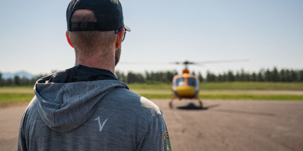 Emergency service male looking at flight for life helicopter.