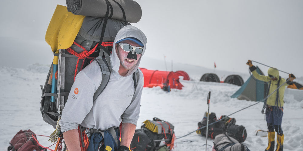 Man hiking up Denali - What Your Body’s Heat Can Tell You About Your Health